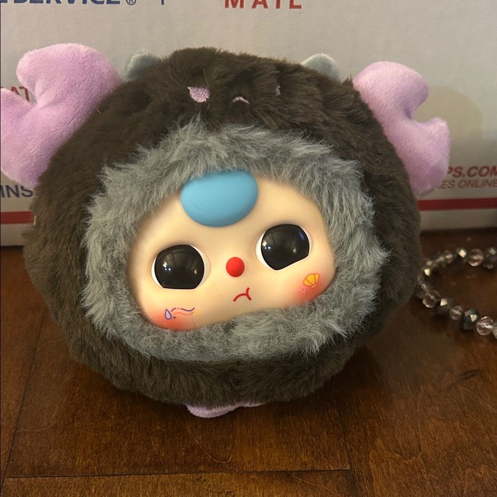 Adorable Plush Doll with Brown and Gray Fur